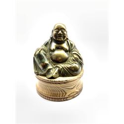 Brass model of a seated Buddha on oak plinth, H17cm 