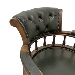 Late 20th century office swivel captain's chair, upholstered in buttoned green fabric, turned balustrade support, on four splayed supports with castors