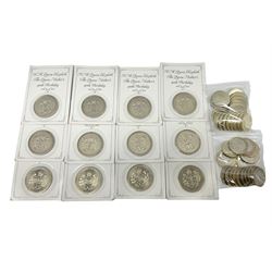 Twelve Queen Elizabeth II 1990 five pound coins each on card, twenty old style two pound coins and eighteen bi-metallic mostly commemorative two pound coins