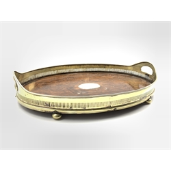  Early 20th Century oak oval tea tray with pierced plated two handled gallery and compressed bun feet W52cm  