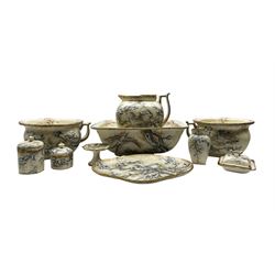 Doulton chine 'Ivory' toilet set comprising ewer, basin, pair of chamber pots, oval tray, two covered jars, soap dish, tooth brush holder and small stand decorated with birds and flowering branches circa 1890, marked 'Doulton & Slaters patent' and 'Doulton Burslem' (10)