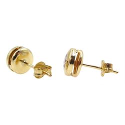 Pair of 9ct gold round cubic zirconia stud earrings, stamped 375