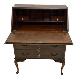 Early 20th century mahogany bureau, fall-front enclosing fitted interior, over three graduating drawers, raised on cabriole feet