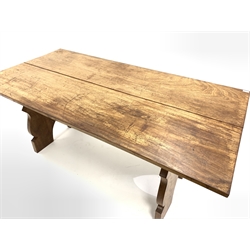 Early 20th century hardwood refectory style table, the rectangular top raised on shaped panel end supports united by pegged stretcher,  91cm x 183cm, H77cm