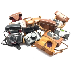 Eight vintage cameras including AGFA Isolette, Zeiss Ikon 'Contina Prontor-svs' and other similar cameras, most with cases