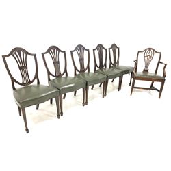 Set of five early 20th century Hepplewhite style mahogany dining chairs, shield backs with pierced and fluted splats, leather upholstered seats, raised on square tapered supports together with an earlier carver of similar design