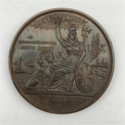 Unidentified medallion, the obverse depicting Queen Victoria, the reverse depicting seated Britannia beside a lion and 'God Bless Our Queen' below, diameter 7.8cm