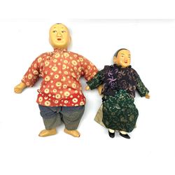 Two Chinese Dolls with composition heads, hands and feet, both wearing tradition costume L28cm max (2)