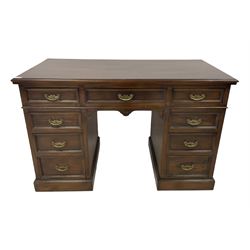 Hardwood pedestal desk, three frieze drawers over six graduated drawers, raised on plinth base 