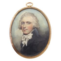 Andrew Plimer (British 1763-1837)
Portrait miniature upon ivory
Head and shoulder portrait of Captain Frederick G Carmichael, 9th Regiment of Light Dragoons
Within period gold frame, with hair work and central gilt monogram 'FD' verso 
Oval 5.5cm x 4.3cm

Andrew Plimer was a well known portrait miniaturist who had a great number of clients up to and during the 1790s. 
After obtaining a position as 'studio boy' in the residence of  eminent miniaturist Richard Cosway, Plimer is said to have taken lessons in drawing with the approval of Cosway, whilst some note that he may have received training from Cosway directly. 
Plimer also exhibited frequently at the Royal Academy from around 1785 until 1810 and later in 1819. 