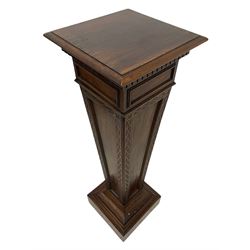 Edwardian mahogany pedestal stand, moulded square top on tapered pedestal decorated with blind fretwork, on stepped and moulded square base