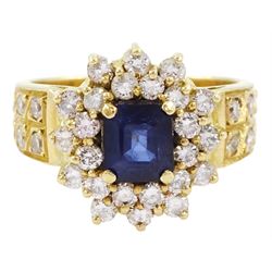 18ct gold octagonal cut sapphire and round brilliant cut diamond cluster ring, with diamond set shoulders, stamped 750, total diamond weight approx 1.10 carat