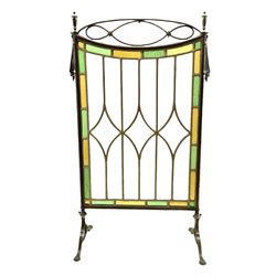 Edwardian leaded glass fire screen with brass openwork frame on splayed supports, H82cm 
