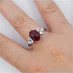 18ct white gold cabochon cut ruby and six stone round brilliant cut diamond ring, hallmarked, ruby approx 3.70 carat, total diamond weight approx 0.55 carat