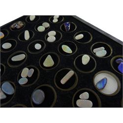 Collection of sixty-six loose opals including black and white opals