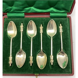 Set of six silver 'Apostle' coffee spoons Birmingham 1906 Maker John Yates & Son,, set of six silver handled pastry knives, cased, two plated bread forks with silver collars and a plated bread knife