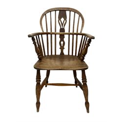 19th century elm and oak Windsor armchair, low double hoop, spindle and splat back over saddle seat, raised on turned supports 