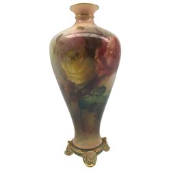 Early 20th century Royal Worcester Hadley Ware vase, of inverted baluster form, hand painted with a display of roses and a single dragonfly, unsigned, upon four scroll moulded feet, with printed and painted marks beneath, date code for 1911, H16.5cm