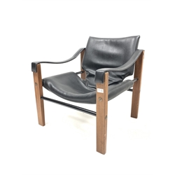 Maurice Burke for Arkana - Mid 20th century 'Safari' chair, with black vinyl seat back and arm rests, raised on square supports, the seat stamped 'Arkana Falkirk, Scotland' under