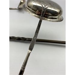 George III silver punch ladle with oval bowl and twisted whale bone handle, marks indistinct, another , the bowl inset with a gold coin, unmarked, and a smaller silver ladle London 1810