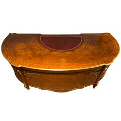 Barnini Oseo - large elm demi-lune 'Reggenza' desk, the banded top with satinwood foliate stringing and inset leather writing surface with gilt edge, fitted with central frieze drawer flanked by six graduating drawers, the ornate uprights with floral scrolled corbels and cabriole supports