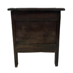18th century oak coffer or chest, rectangular hinged panelled top with moulded frame enclosing candle box, the frieze carved with foliate S-scrolls over a quadruple panel front decorated with carved lozenges, on stile supports