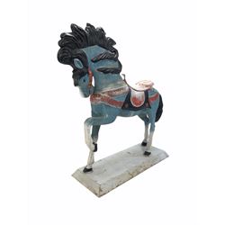 Large painted cast metal model of a horse, raised on a rectangular base