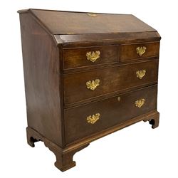 Georgian oak bureau, fall front over two short and two long cock-beaded drawers, on bracket feet