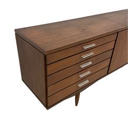 Arthur Edwards for White & Newton - mid-20th century teak sideboard, fitted with five graduating drawers beside a double cupboard enclosing two shaped shelves