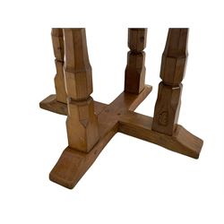 'Oakleafman' oak dining table, adzed octagonal top, quadruple octagonal pillar supports, one carved with leaf signature, on x-shaped sledge base, by David Langstaff of Easingwold 