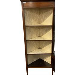 Ernest Firth - early 20th century mahogany corner display cabinet, the raised back over astragal glass panelled door, enclosing and three fitted shelves, raised on squared tapering supports 