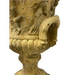 Pair of composite stone classical design urns, campana shape with relief frieze depicting the Muses, on square pedestal base