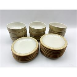 Nine Denby Caramel Stripes pattern bowls and twelve matching plates 