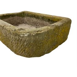 Small 19th century weathered sandstone D-shaped shallow trough (56cm x 40cm, H17cm); and a 'Bamlet' vintage tractor seat in red paint finish (W41cm)