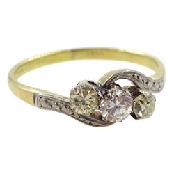 Gold three stone diamond ring, stamped 18ct, gold rectangular brooch and a silver coin bracelet