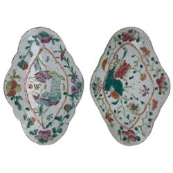 Pair of 19th century Chinese famille verte quatrefoil stem dishes, decorated with figures and foliage, L19cm together with a pair of 19th century Chinese famille rose cricket boxes and covers, each of lozenge form painted with figures in a garden, L12.5cm. Provenance: From the Estate of the late Dowager Lady St Oswald