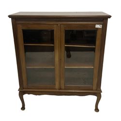 Early 20th century hardwood display cabinet, egg and dart cornice over two glazed doors, shaped apron over cabriole supports with pad feet