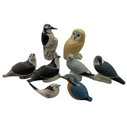 Group of eight Scottish 'Isle of Arran' bisque porcelain birds comprising two Ospreys, Peregrine Falcon, Kingfisher, Great Spotted Woodpecker, Barn Owl, Hen Harrier and a Long Tailed Tit (8)