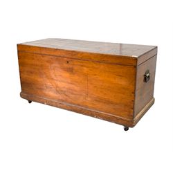 Victorian stained pine blanket box, hinged lid revealing plain interior, carry handles to each end, raised on a skirted base and castors, 2cm x 55cm, H65cm