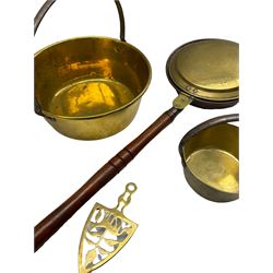 Large brass jam pot, smaller brass jam pot, bed pan, brass tripod trivet and another trivet (5)
