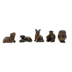 Five netsuke, modelled as a ram, owl, dog, cat and monkey with child