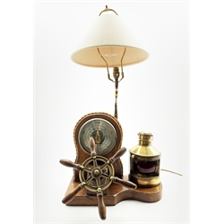  Oak table lamp formed with a Nautical theme with aneroid barometer,  Port lantern and six spoke wheel H80cm  
