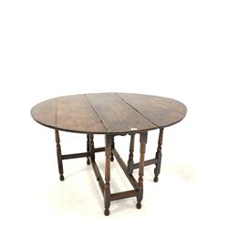 18th century style oak gate leg drop leaf table, oval top raised on turned supports and moulded stretchers W100cm