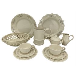 Leeds Classical Creamware comprising two serving dishes, twin-handled preserve jar and cover, tankard, jug and two plates, together with a pair of Hartley Greens & Co Leeds Pottery creamware cups and saucers and a Royal Creamware oval basket (12)