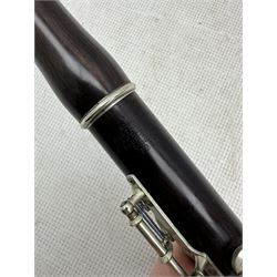 Early 20th century rosewood flute by Rudall, Carte & Co Ltd, 23 Berners St, London, no. 7319, nickel plated keys, in original green velvet lined case, total length of flute 68cm