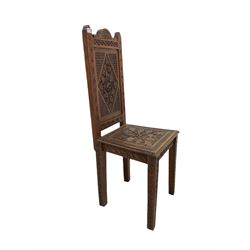  Oak  hall chair with carved panelled seat and back on square tapering supports