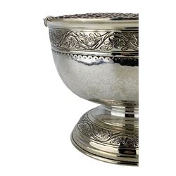 Liberty & Co silver Arts and Crafts rose bowl with spot hammered decoration and trailing bands of flowers on a short pedestal foot D25.5cm Birmingham 1938